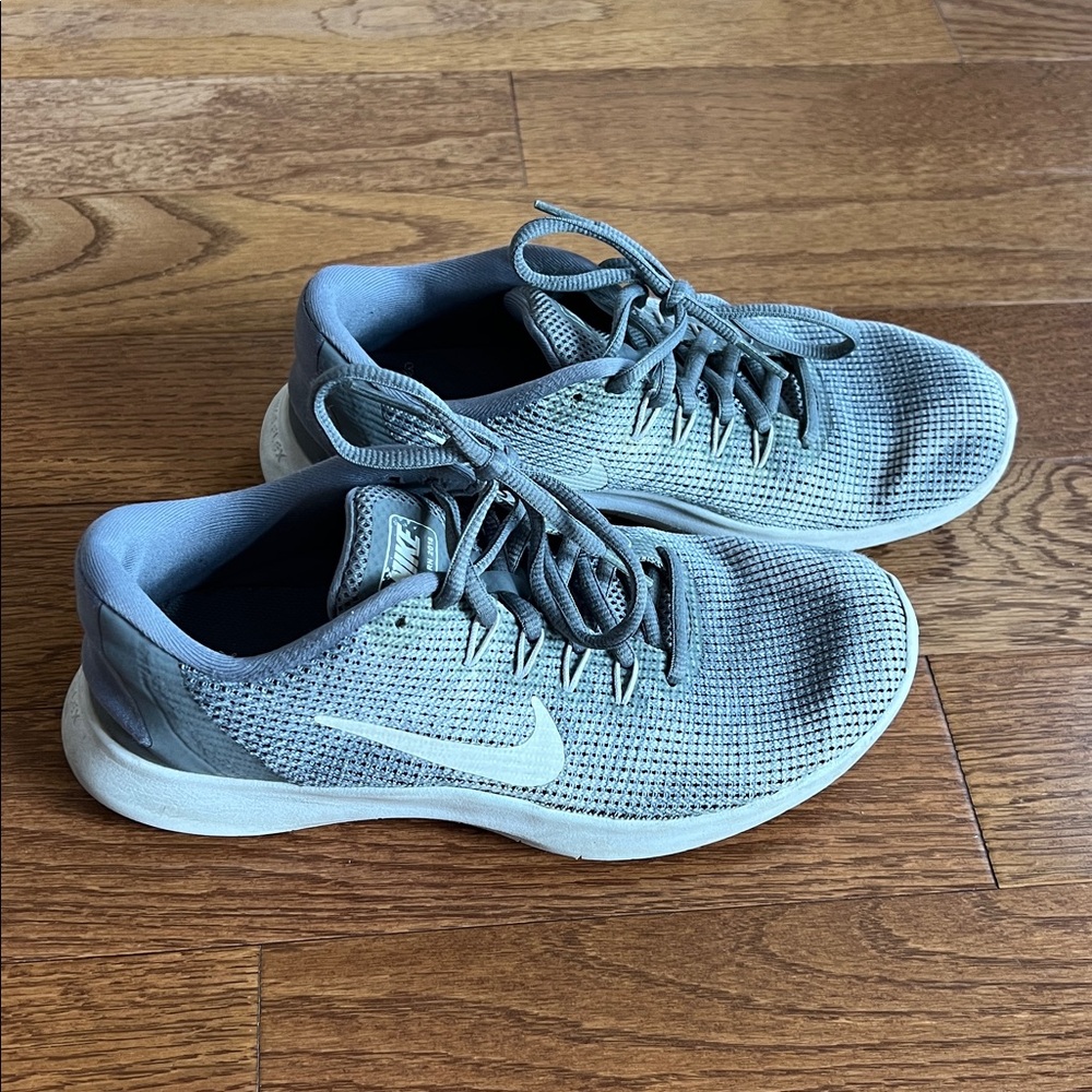 Grey and white Nike Flex Running sneakers size 7